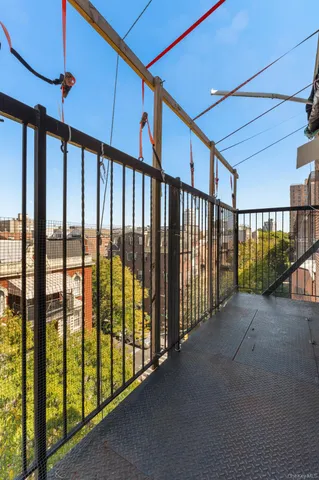 a view of staircase with rug