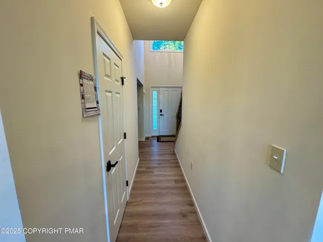 a bathroom with a sink toilet and mirror