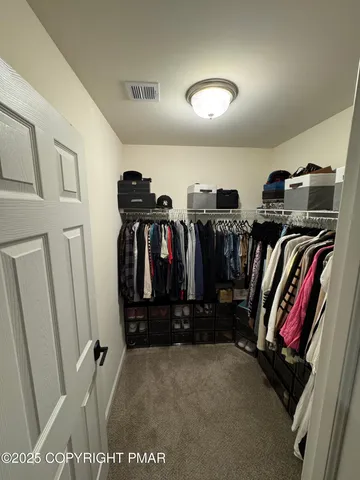 a view of a livingroom with a bathroom