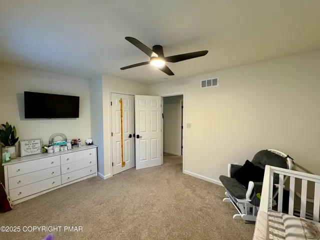 a view of a workspace with furniture