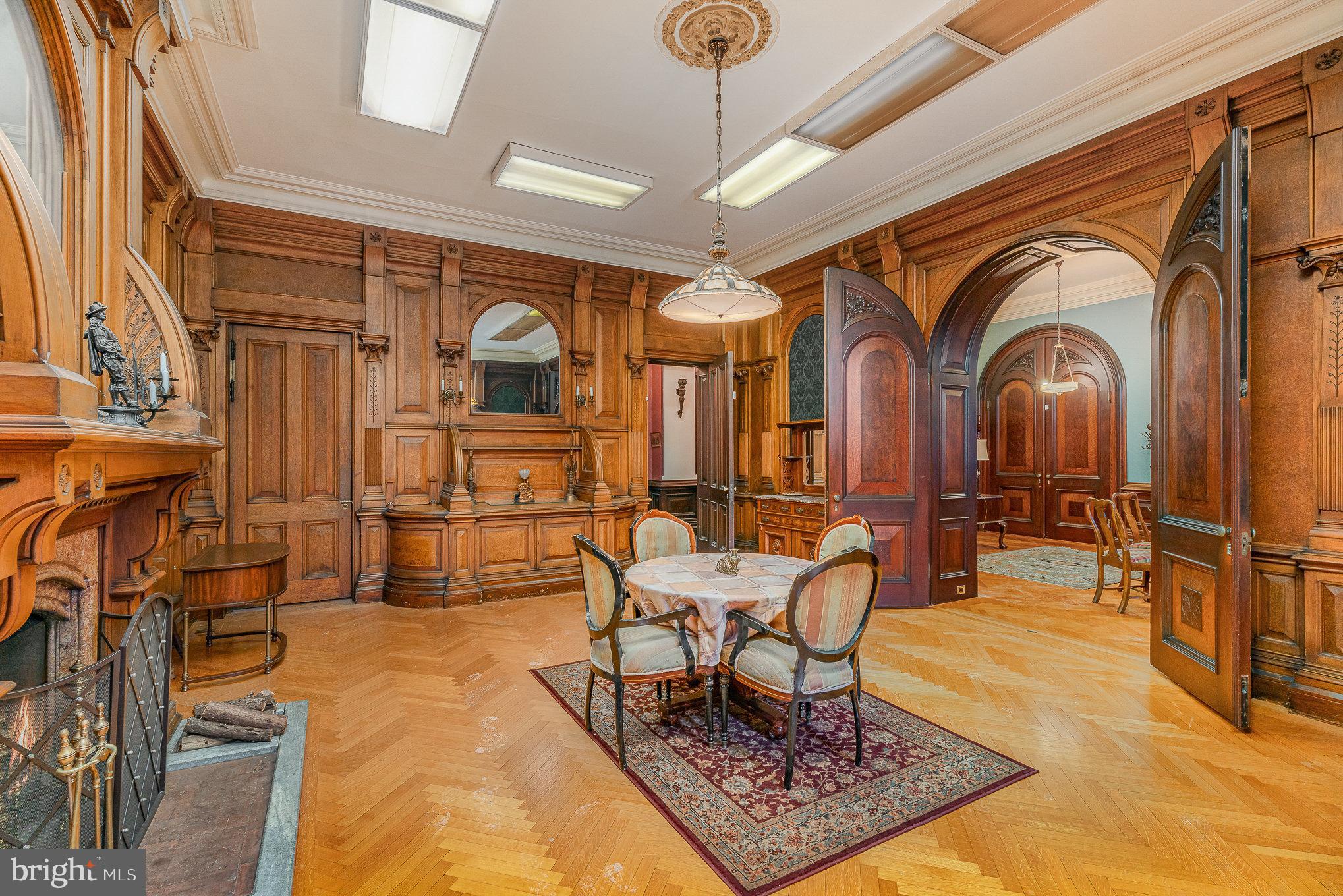 407 North Front Street Harrisburg, PA 17101 - Photo 12 of 52 a living room with furniture a dining table and chairs with wooden floor