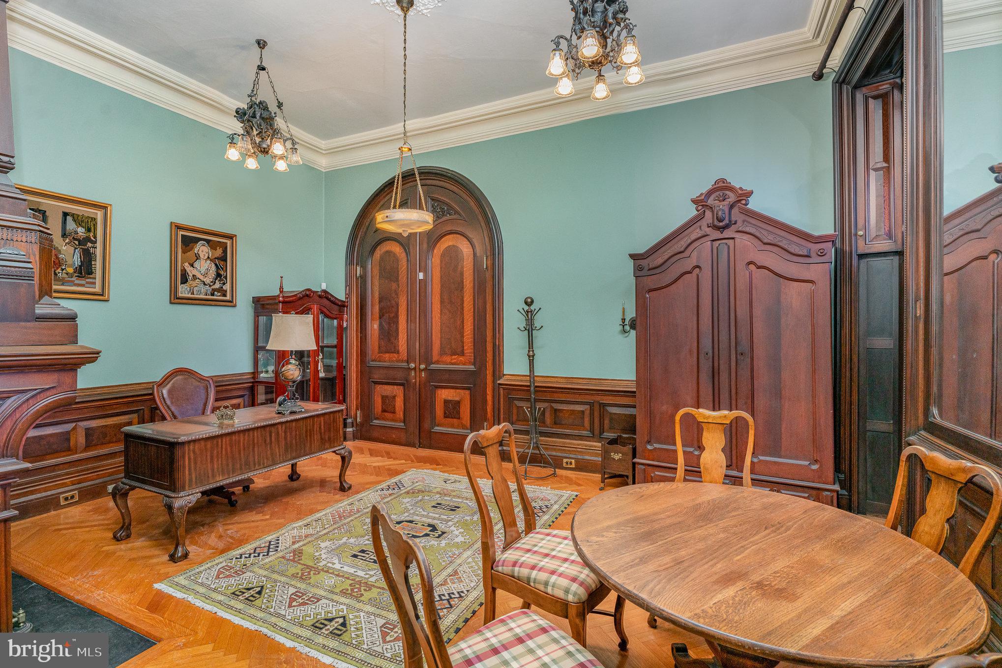 407 North Front Street Harrisburg, PA 17101 - Photo 13 of 52 a living room with furniture a chandelier and a window