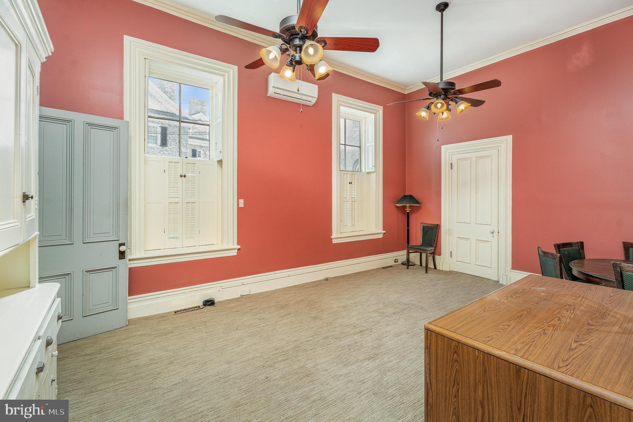 407 North Front Street Harrisburg, PA 17101 - Photo 15 of 52 a room with chandelier fan and windows