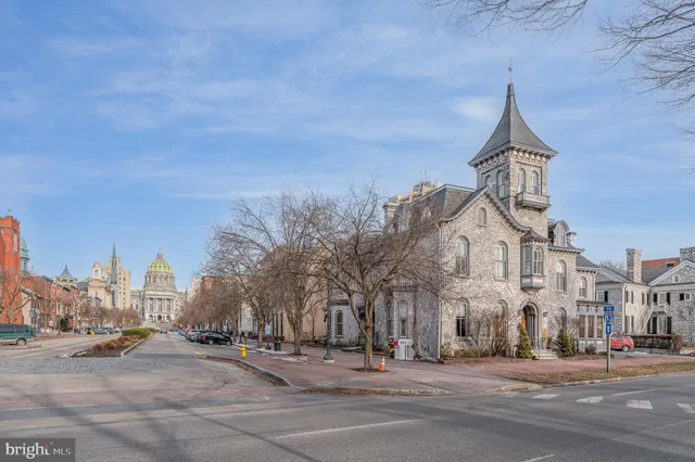 a street view along with residential houses
