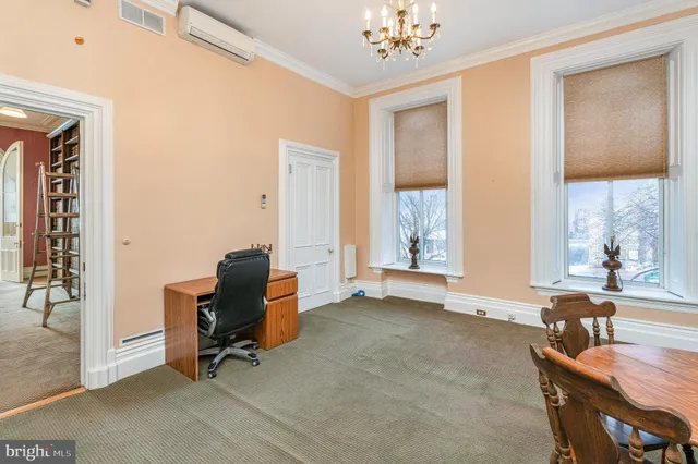 a view of a chandelier in a room