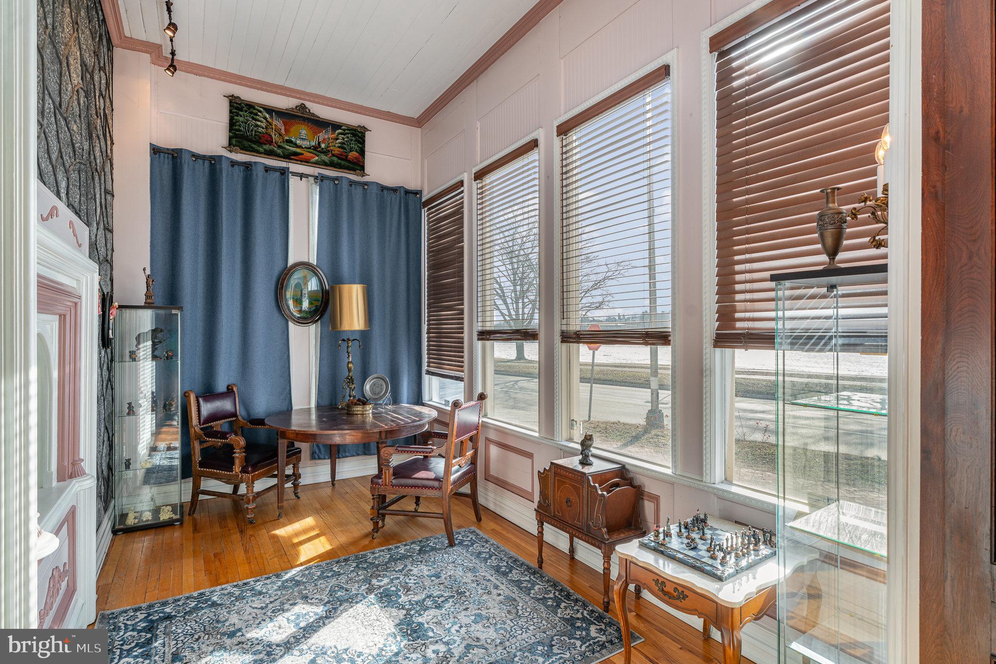 407 North Front Street Harrisburg, PA 17101 - Photo 9 of 52 a living room filled with furniture and a window
