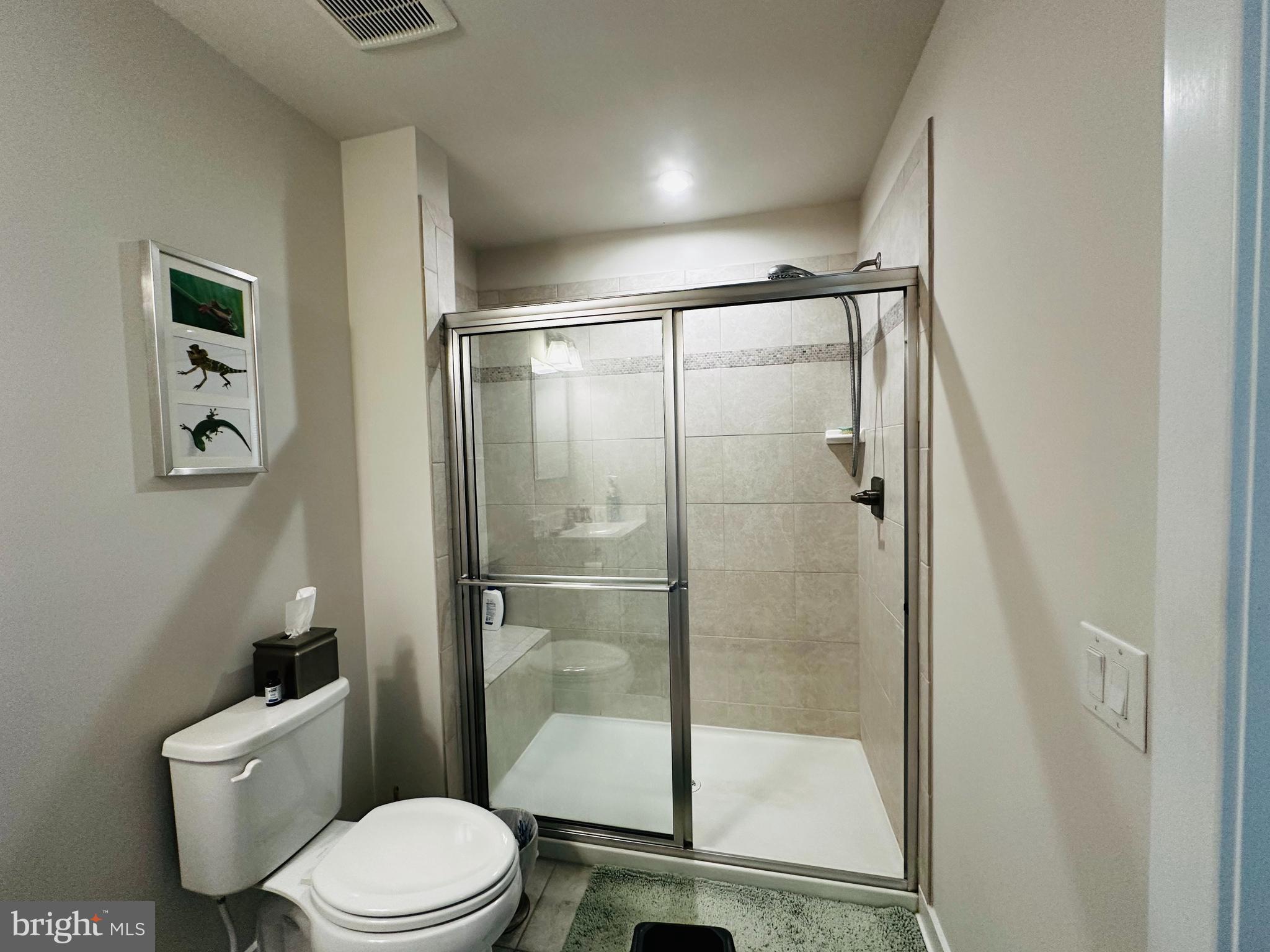 100 Senators Way Berlin, NJ 08009 - Photo 15 of 25 a white toilet next to a bathroom sink