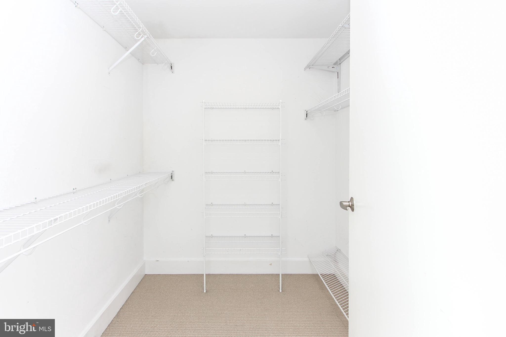 2772 Lighthouse Point East, Unit 202 Baltimore, MD 21224 - Photo 15 of 35 Walk-In Closet