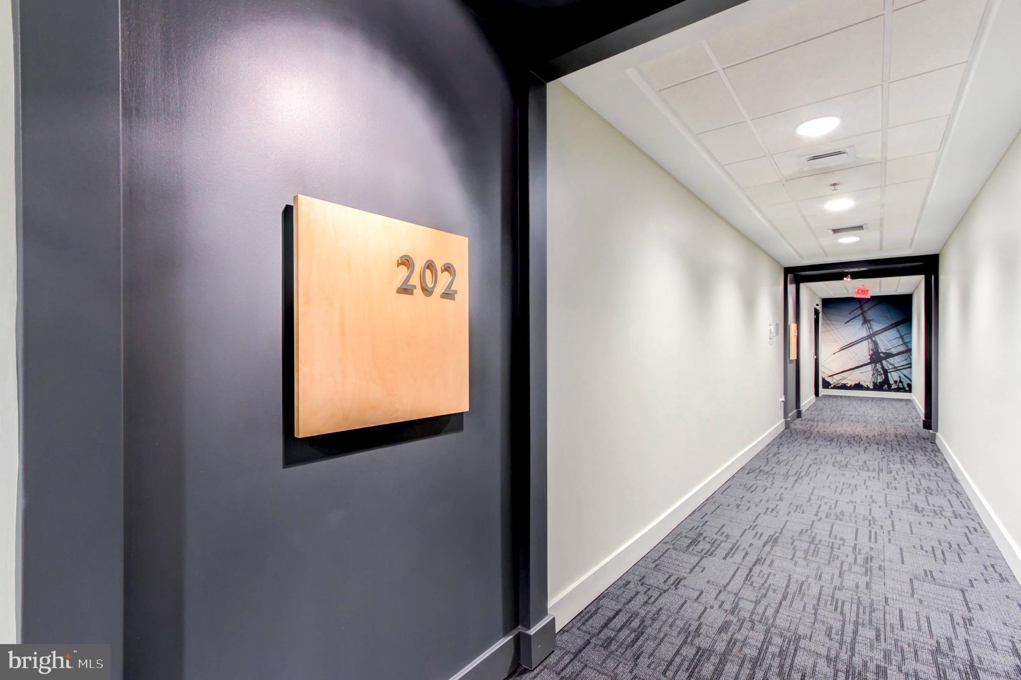 2772 Lighthouse Point East, Unit 202 Baltimore, MD 21224 - Photo 17 of 35 Hallway Vuew