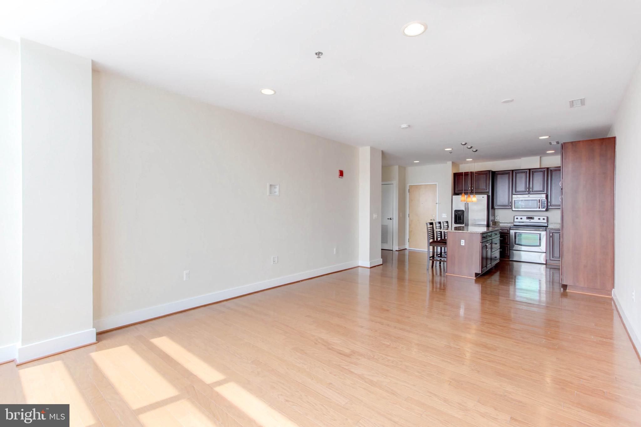 2772 Lighthouse Point East, Unit 202 Baltimore, MD 21224 - Photo 7 of 35 Living Room