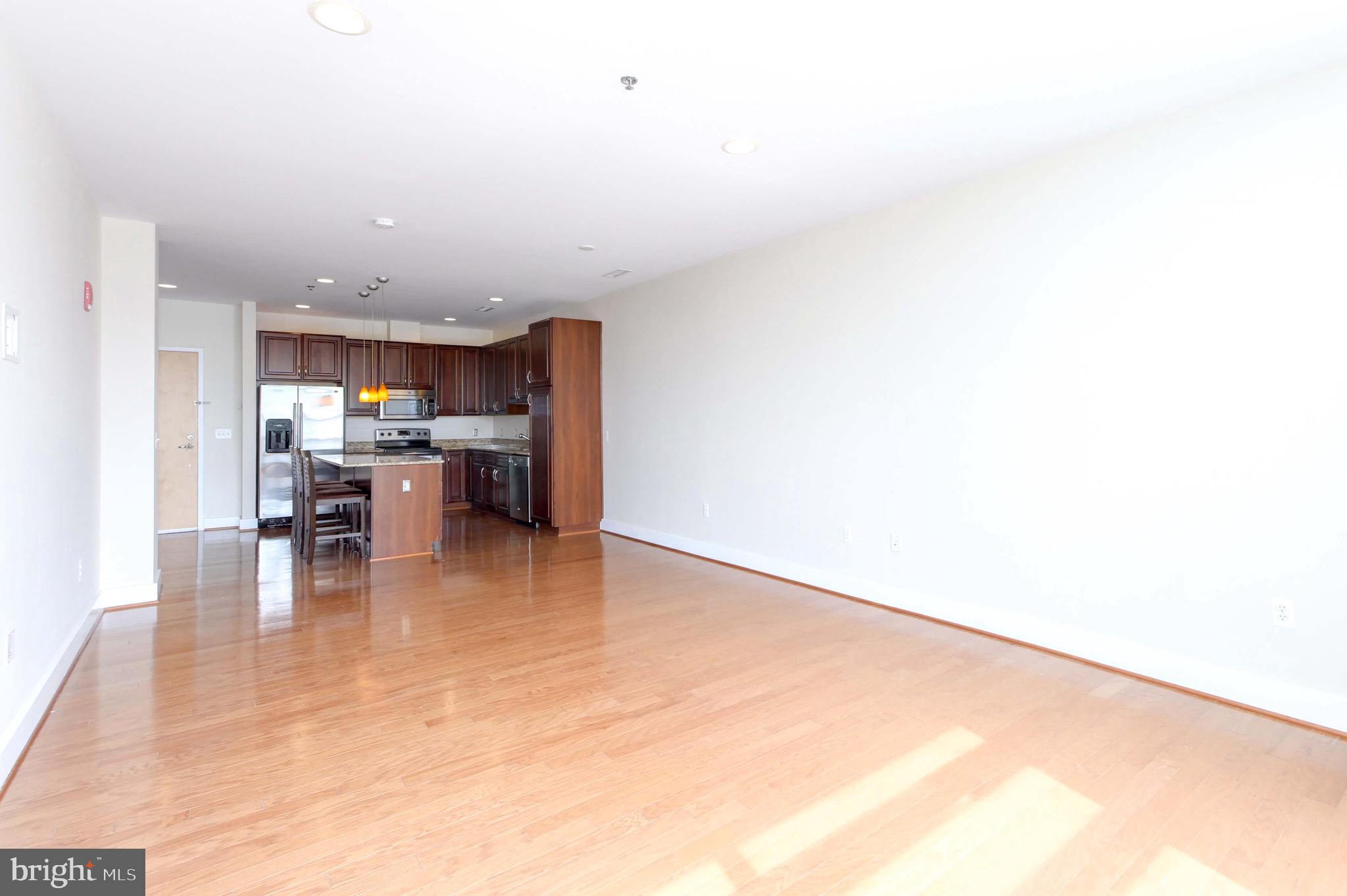 2772 Lighthouse Point East, Unit 202 Baltimore, MD 21224 - Photo 8 of 35 Living Room