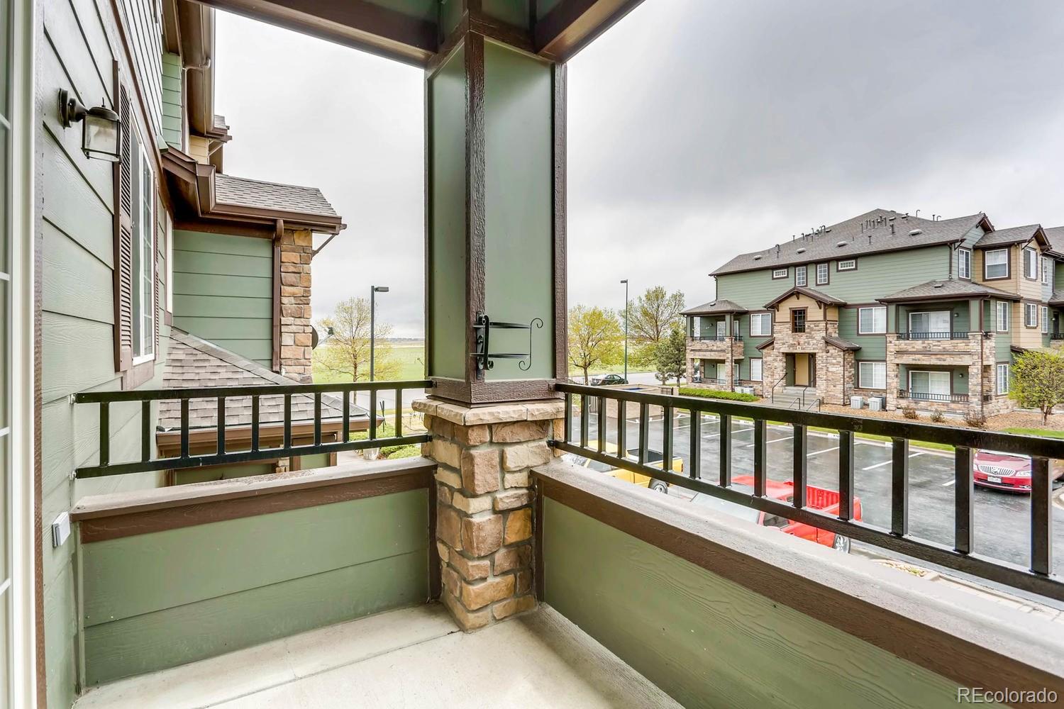 5255 Memphis Street, Unit 811 Denver, CO 80239 - Photo 12 of 12 a view of a balcony with city view