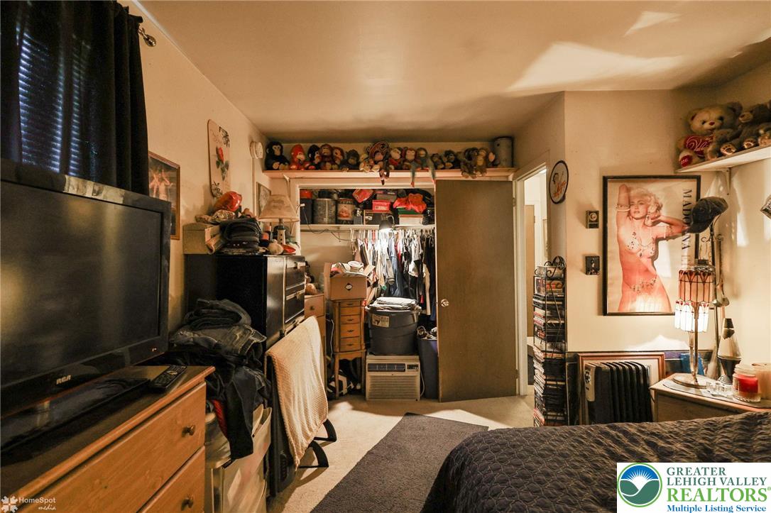 802 West Berwick Street Easton, PA 18042 - Photo 35 of 54 a bed room with a bed and a couch