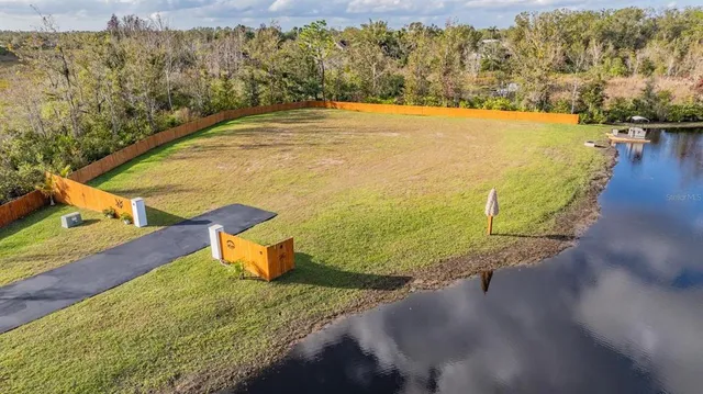 a view of a lake with a outdoor space