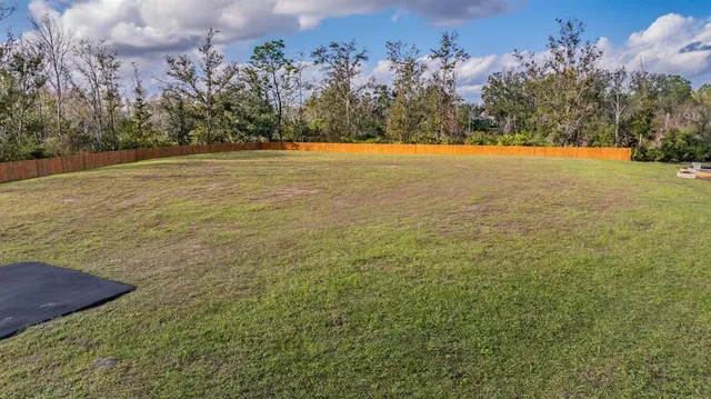a view of a lake in middle of the house