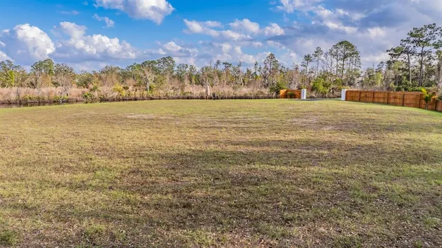 a garden view with a lake view