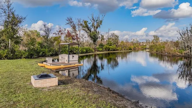 a view of a lake with outdoor space
