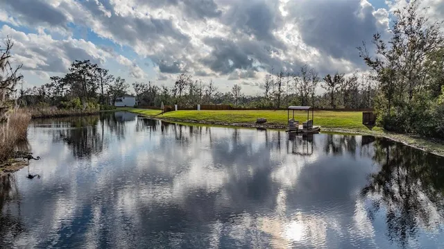 a view of a lake with a mountain in the background