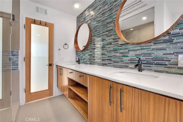 a white tub sitting in a bathroom