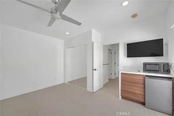 a view of a livingroom with a flat screen tv