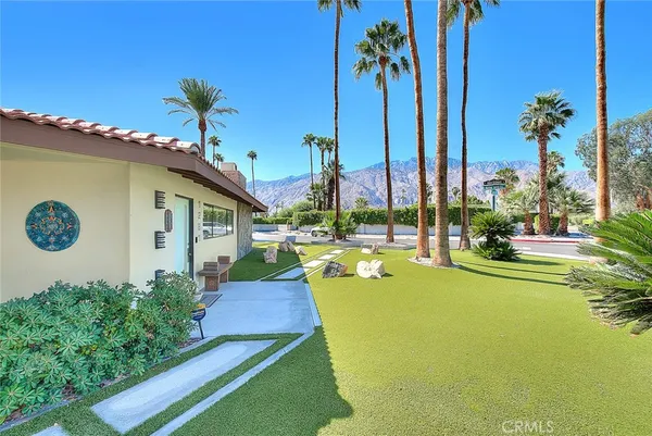 a view of a house with swimming pool