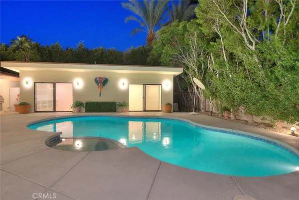 a view of a house with a swimming pool