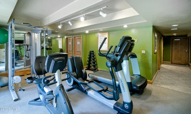 a view of a room with gym equipment