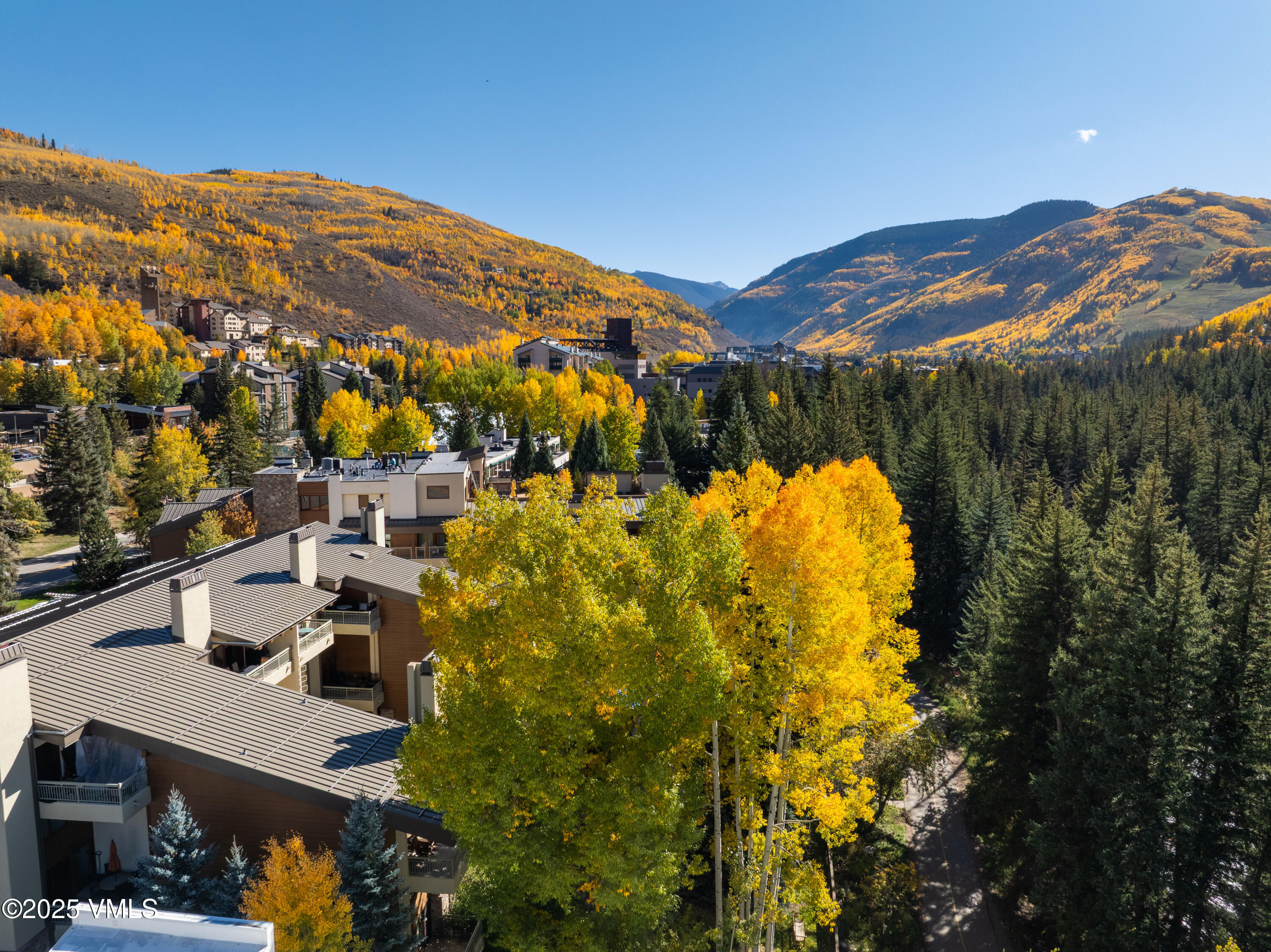 390 East Lionshead Circle, Unit 103 Vail, CO 81657 - Photo 18 of 22 a view of a house with a mountain
