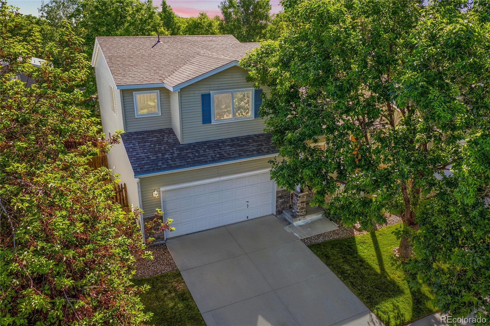 1290 Trail Ridge Road Longmont, CO 80504 - Photo 3 of 38 a house view with a outdoor space