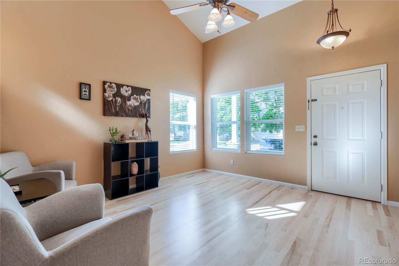 1290 Trail Ridge Road Longmont, CO 80504 - Photo 6 of 38 a living room with furniture and a window