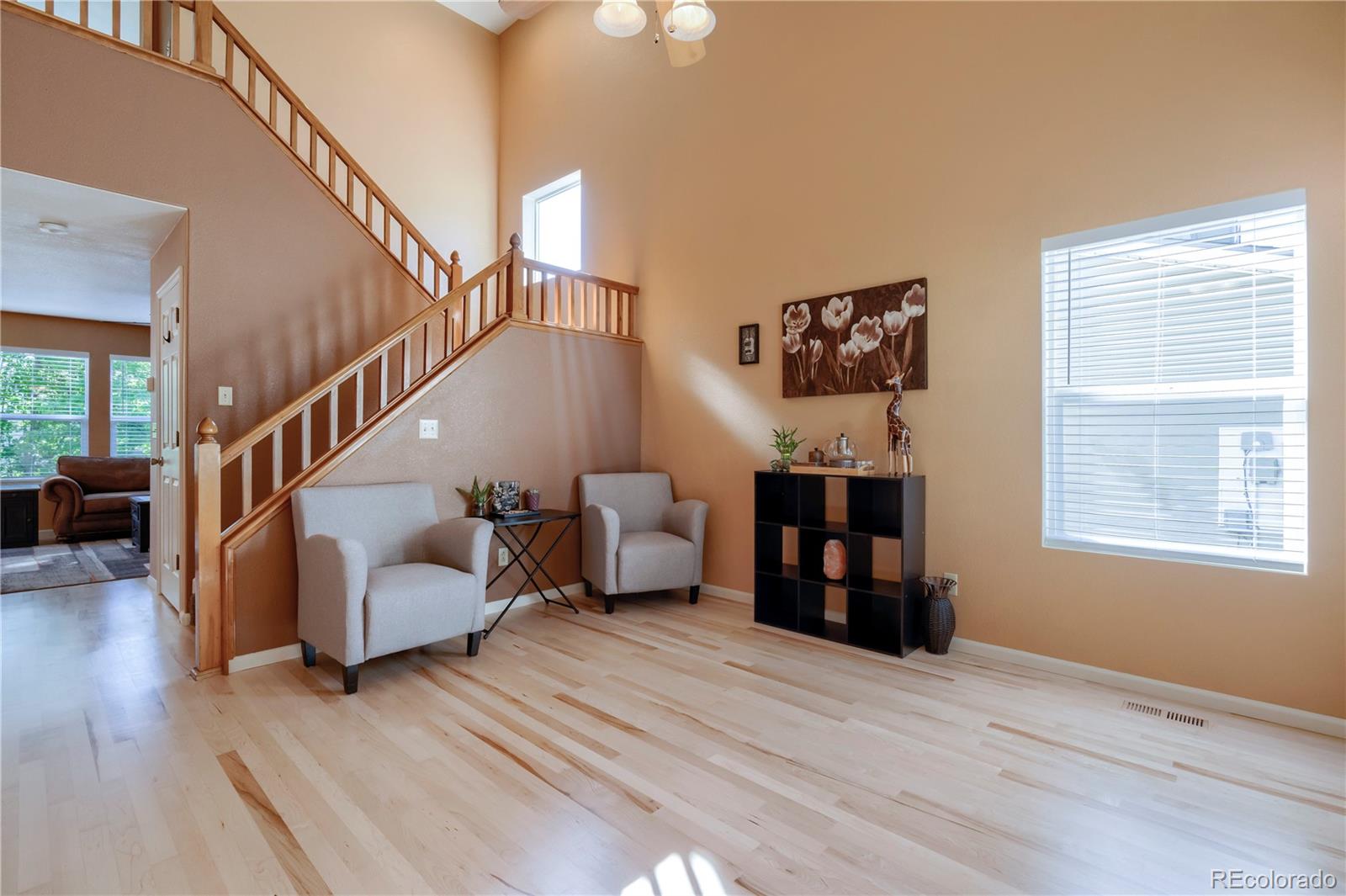 1290 Trail Ridge Road Longmont, CO 80504 - Photo 7 of 38 a view of livingroom with furniture and wooden floor