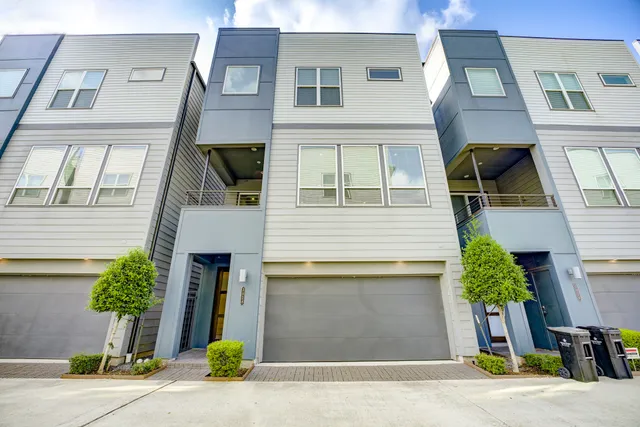 a front view of a multi story residential apartment building