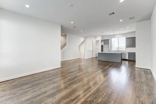 a view of kitchen view wooden floor and window
