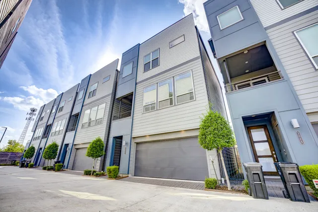 a view of multiple house with street