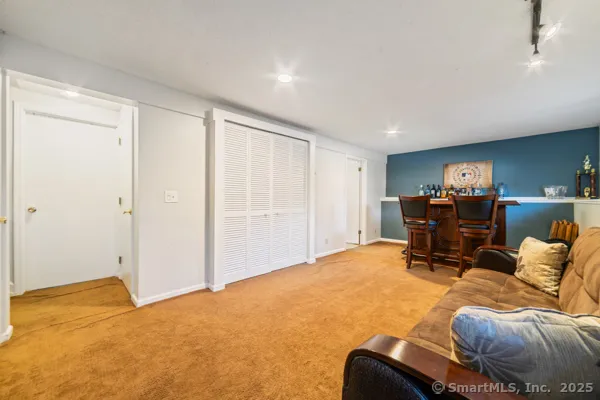 a workspace with furniture and a window