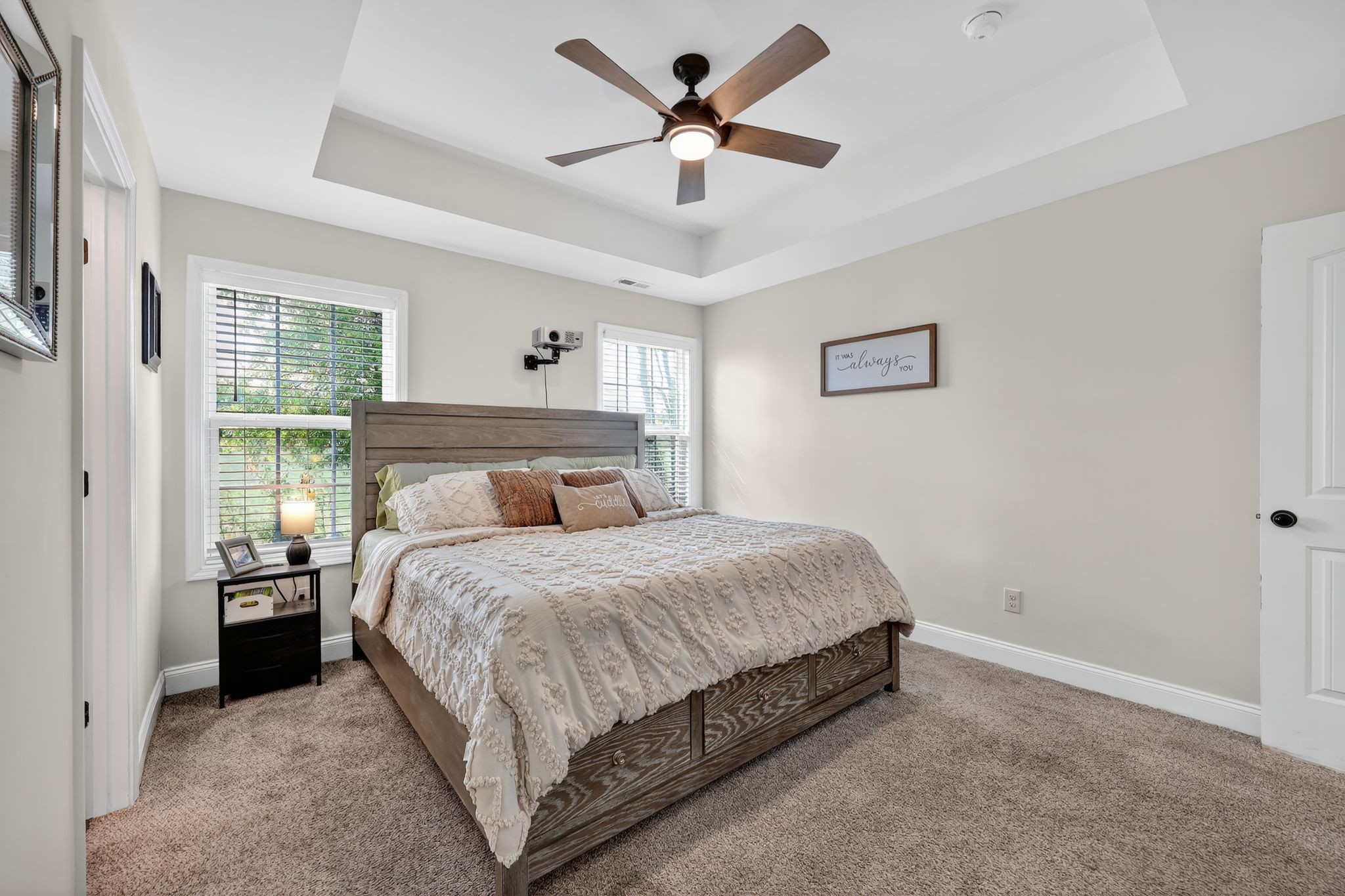 349 Fieldstone Lane Springfield, TN 37172 - Photo 17 of 40 a spacious bedroom with a bed and a ceiling fan