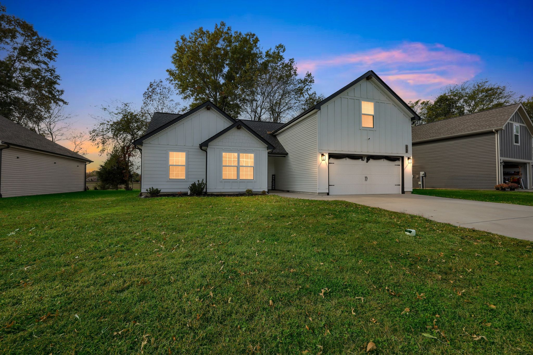 349 Fieldstone Lane Springfield, TN 37172 - Photo 39 of 40 a front view of a house with a garden and yard