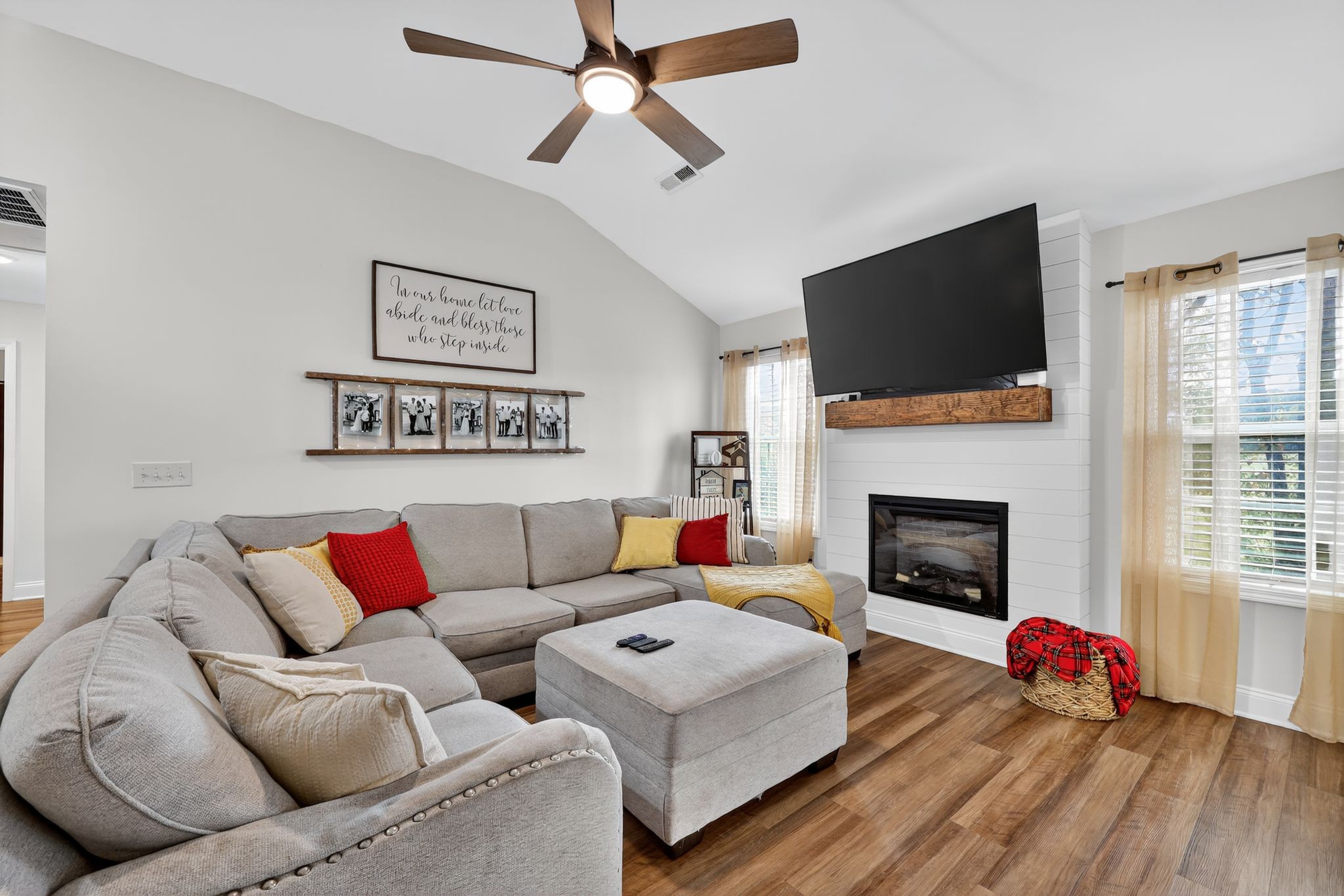 349 Fieldstone Lane Springfield, TN 37172 - Photo 8 of 40 a living room with furniture fireplace and flat screen tv