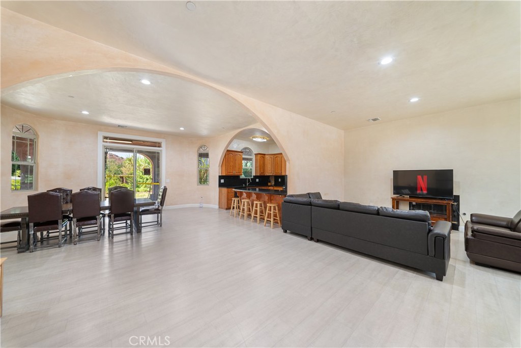 12605 Kagel Canyon Road Sylmar, CA 91342 - Photo 11 of 61 a living room with furniture and a flat screen tv