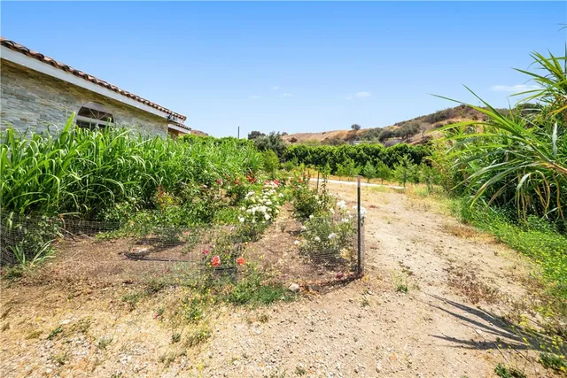 a view of outdoor space with playground and green space