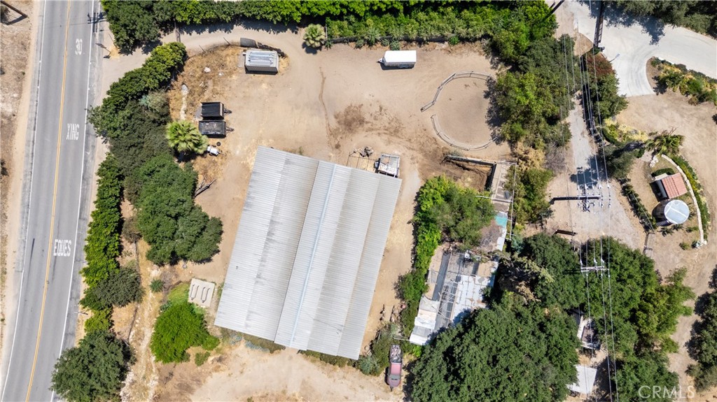 12605 Kagel Canyon Road Sylmar, CA 91342 - Photo 59 of 61 an aerial view of a house with a yard and a wooden fence