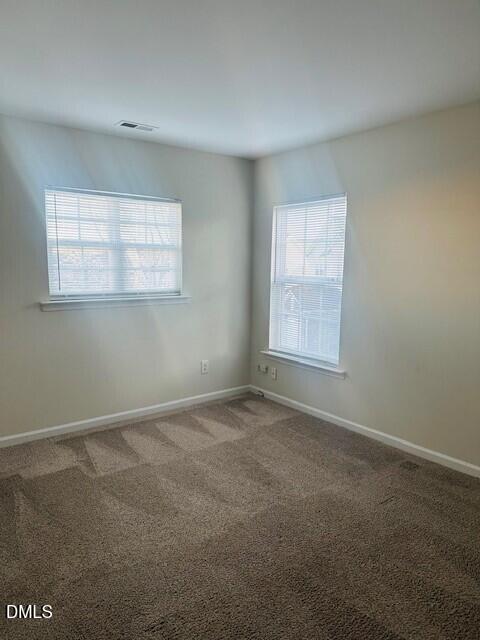 6005 Namozine Court Raleigh, NC 27610 - Photo 11 of 24 an empty room with a window