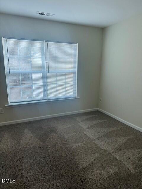 6005 Namozine Court Raleigh, NC 27610 - Photo 15 of 24 a view of an empty room with a window