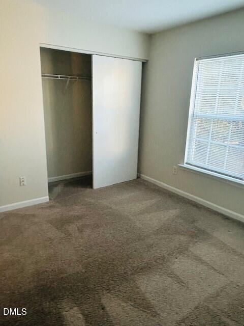 6005 Namozine Court Raleigh, NC 27610 - Photo 16 of 24 an empty room with windows and closet