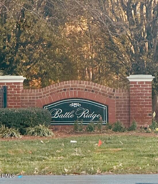 6005 Namozine Court Raleigh, NC 27610 - Photo 24 of 24 a sign that is sitting on a brick wall