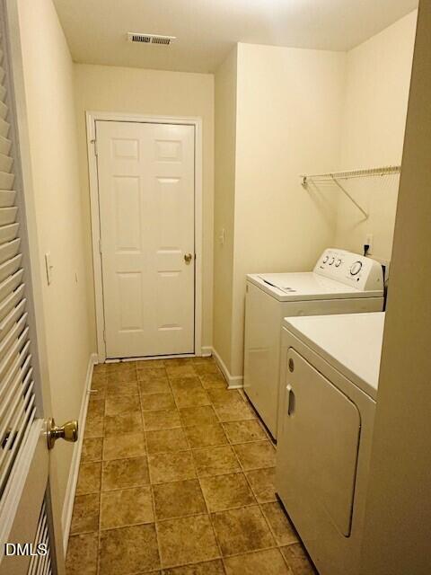 6005 Namozine Court Raleigh, NC 27610 - Photo 10 of 24 a view of utility room with washer and dryer