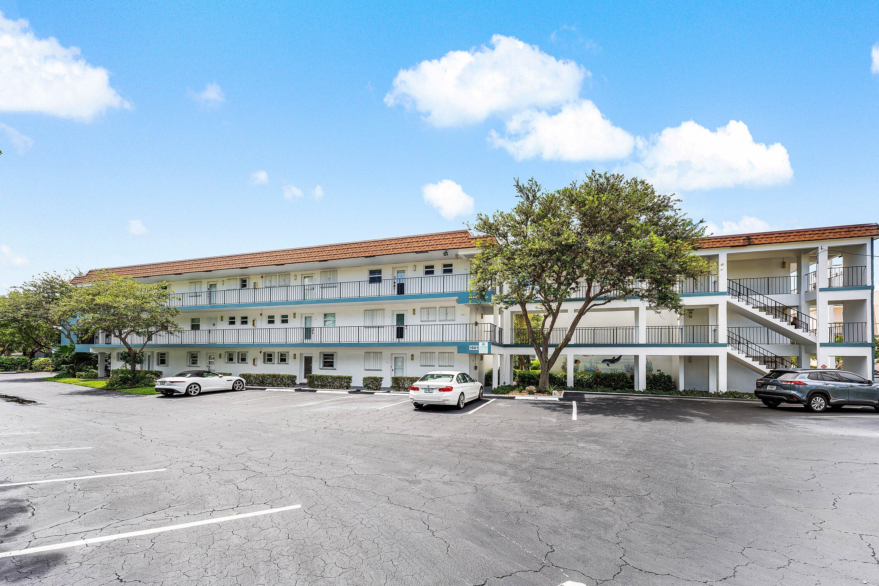 1501 South Ocean Boulevard, Unit 225 Lauderdale-by-the-Sea, FL 33062 - Photo 17 of 47 a car parked in front of a building