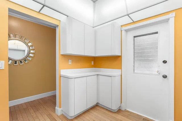 a kitchen with stainless steel appliances a stove a sink and a refrigerator