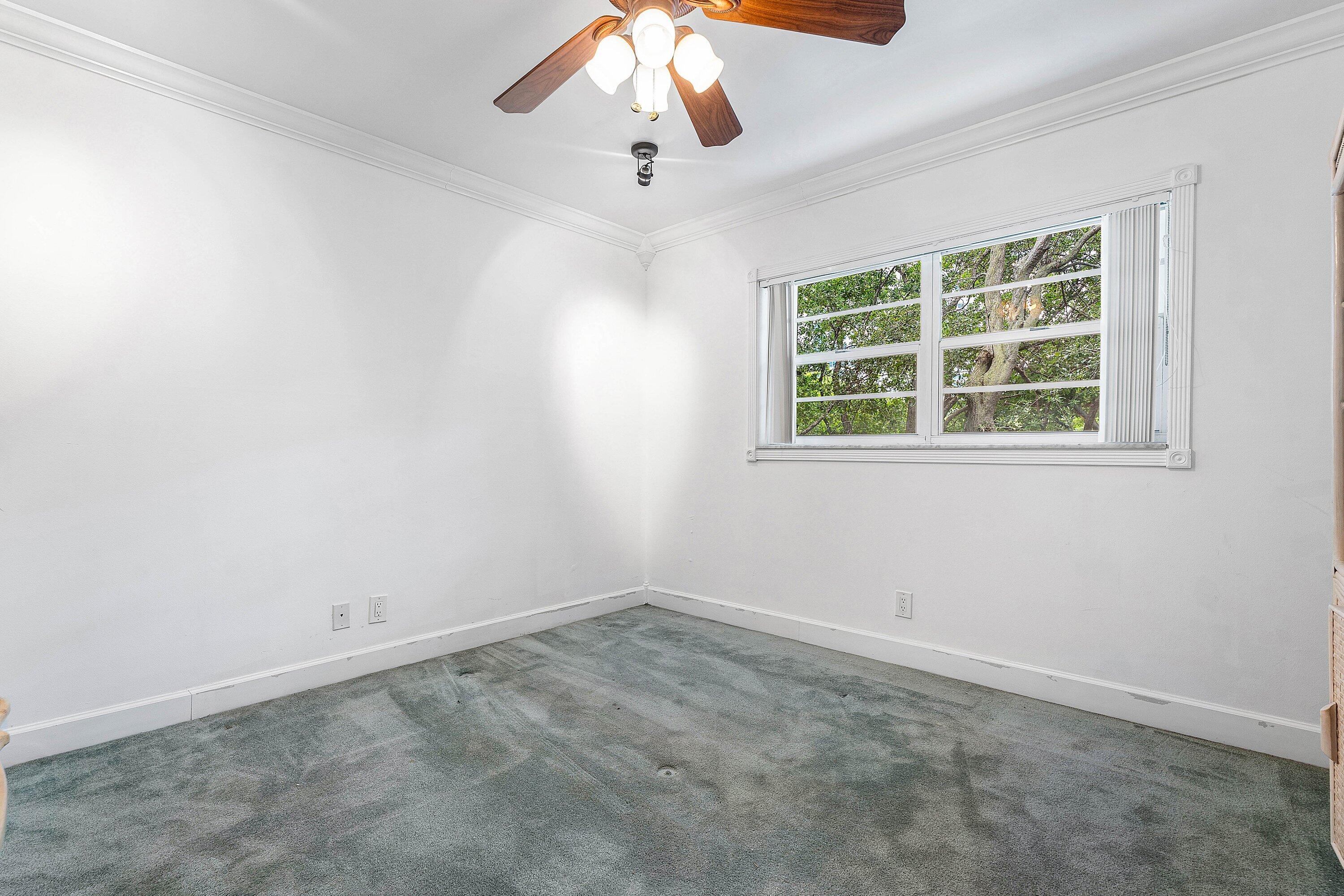 1501 South Ocean Boulevard, Unit 225 Lauderdale-by-the-Sea, FL 33062 - Photo 25 of 47 an empty room with a window