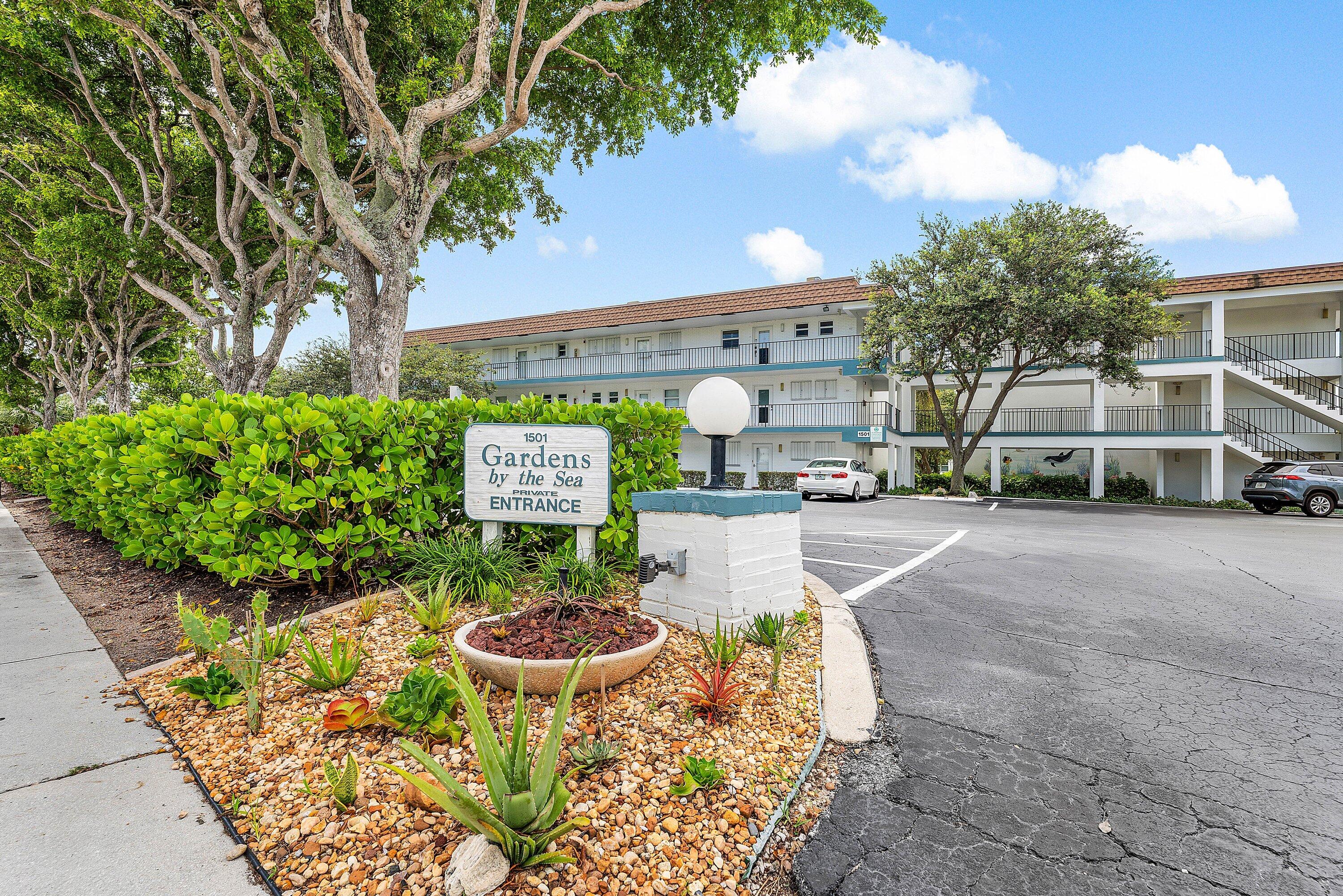 1501 South Ocean Boulevard, Unit 225 Lauderdale-by-the-Sea, FL 33062 - Photo 3 of 47 a car parked in front of a building